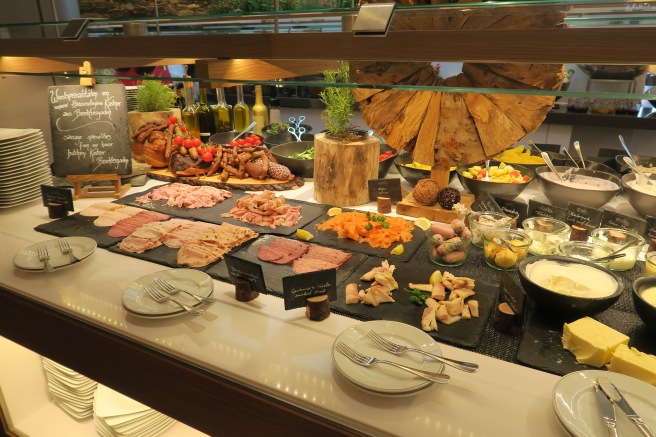 a buffet table with different food items