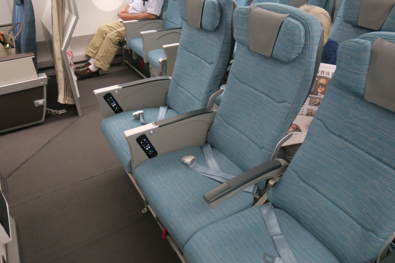 a row of blue seats