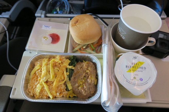 food on a tray on a plane