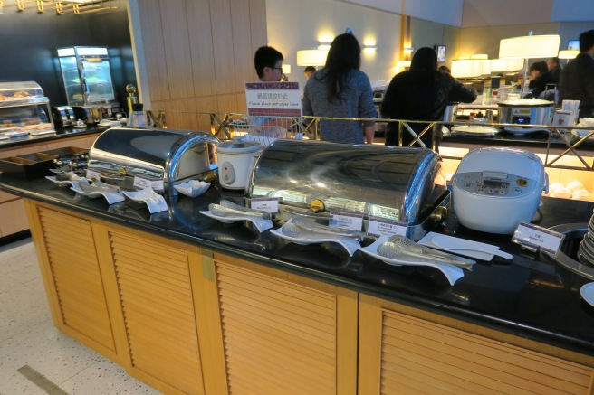 a buffet line with food on it