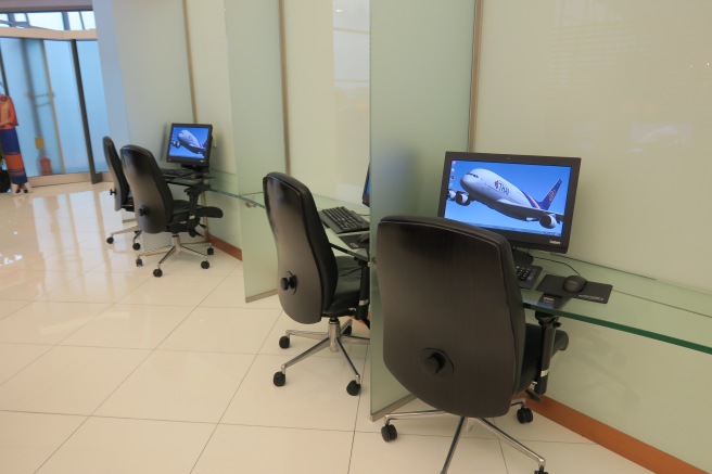 a row of computers in a room