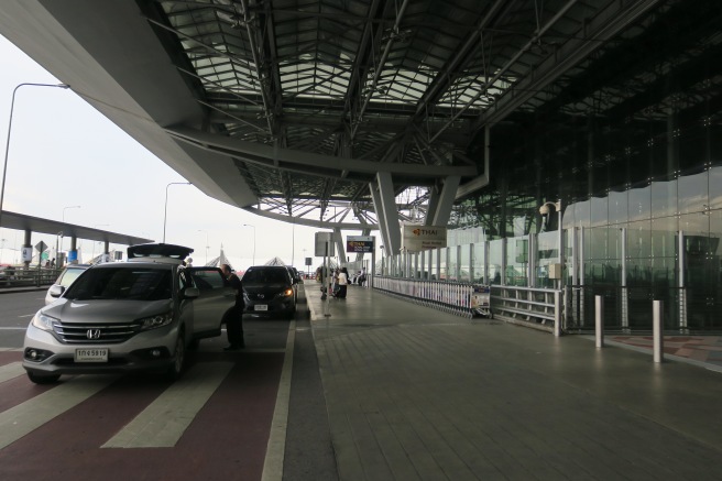 cars parked cars at an airport