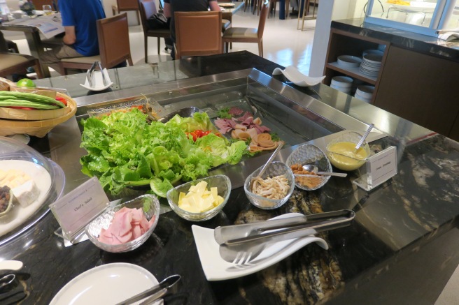 a buffet table with food on it