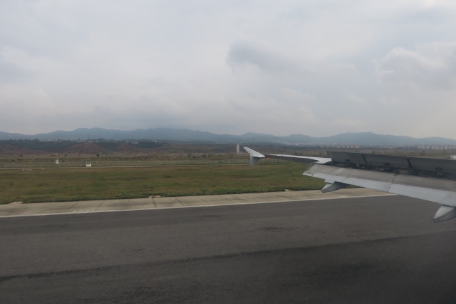 an airplane wing on a runway