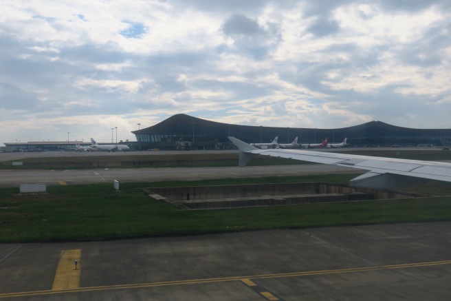 an airplane wing on the runway