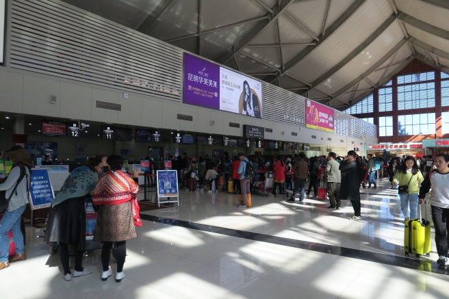 a group of people in a terminal