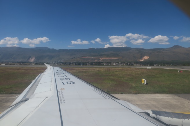 an airplane wing in the air