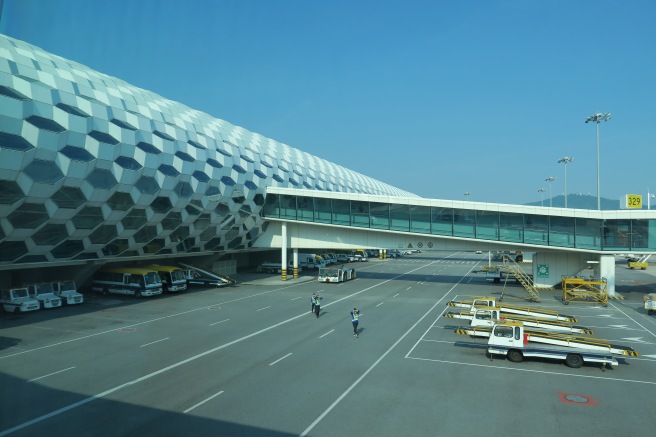 a large building with a large white structure