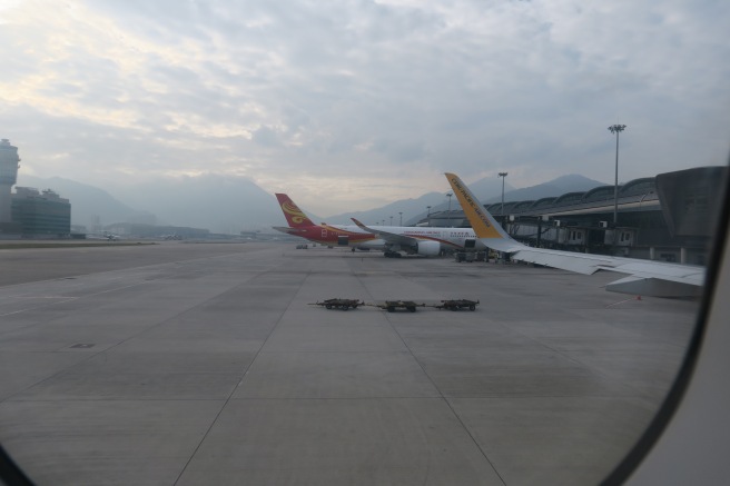 airplanes parked on a runway