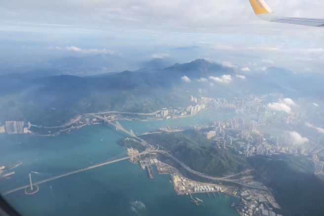 a aerial view of a city and a body of water