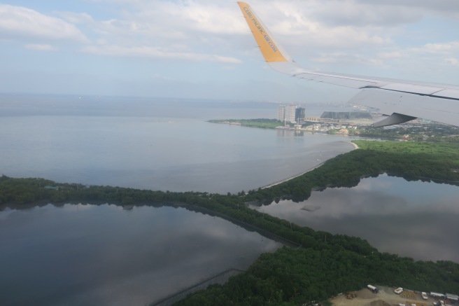 an airplane wing over water