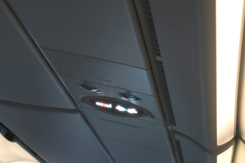 a light on the ceiling of an airplane