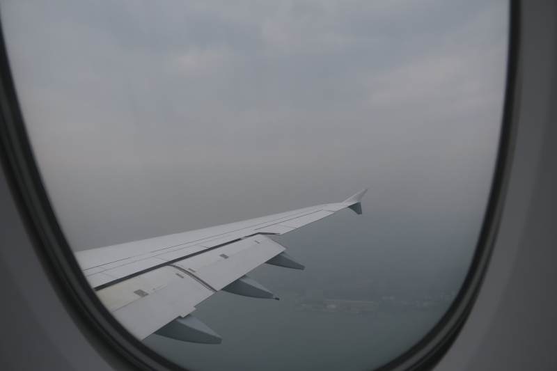 an airplane wing in the sky