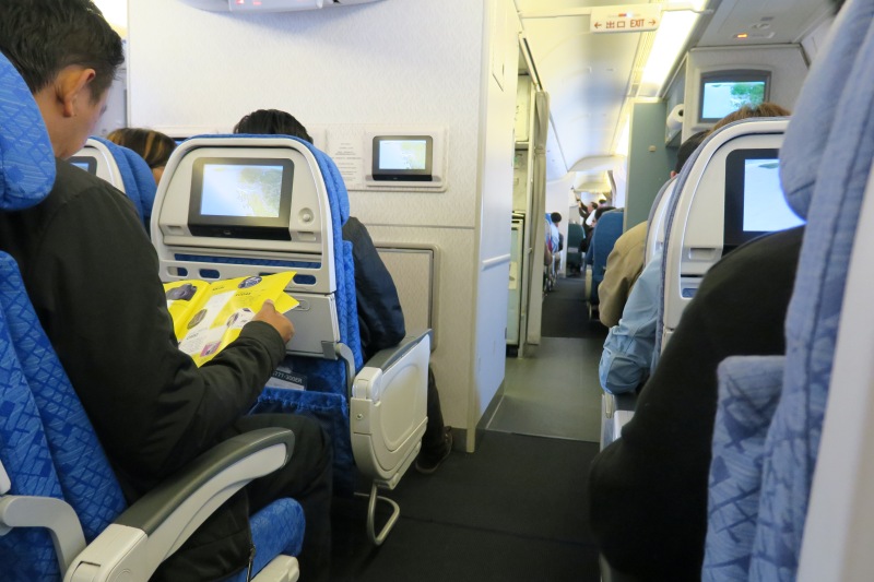 a group of people sitting in a plane