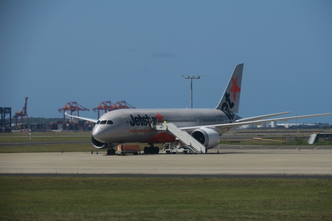 a jet plane on the runway