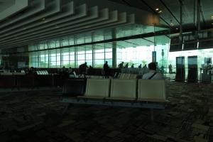 a group of people sitting in a waiting area