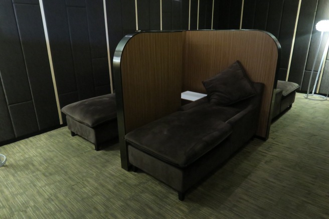 a couch and ottoman in a room