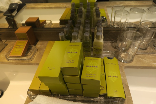 a group of bottles and glasses on a counter