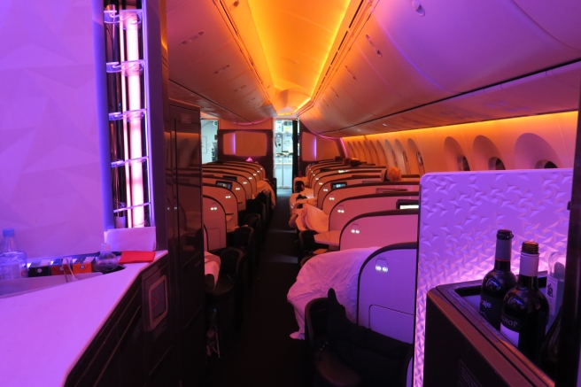 inside an airplane with purple lights