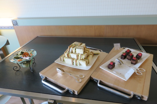 a trays of desserts on a table