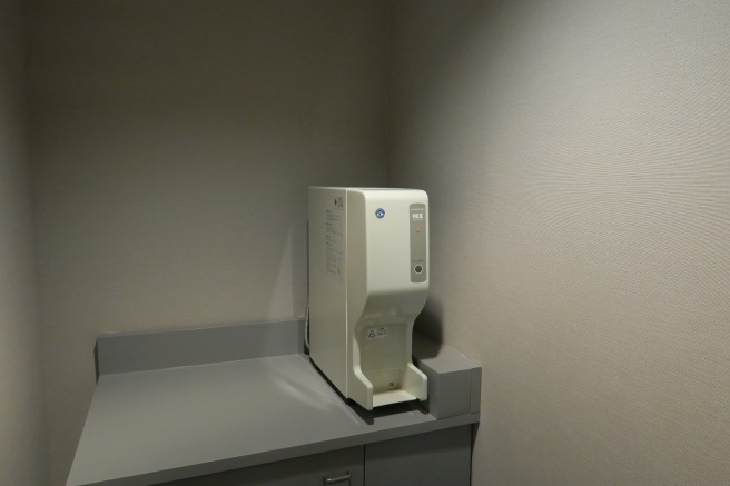 a white machine on a counter