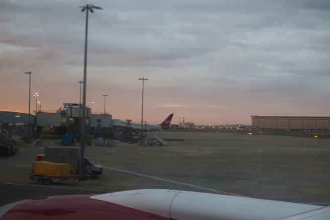 an airport with an airplane in the background