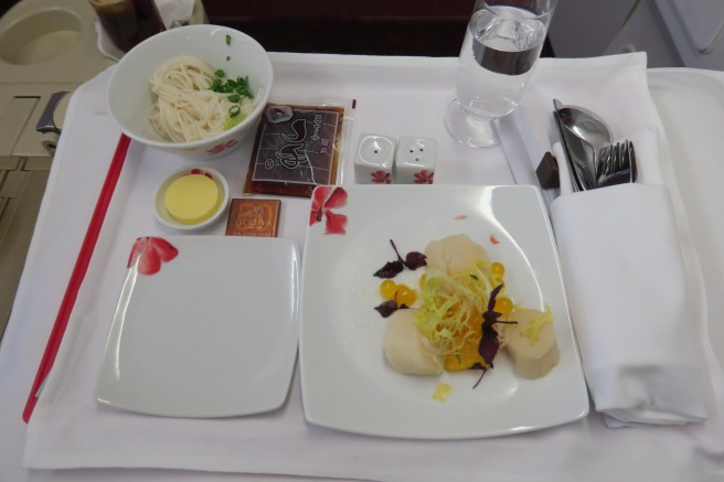 a plate of food on a tray