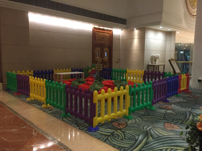 a colorful fence in a room