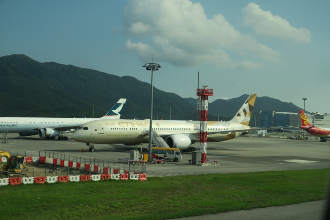 a large white airplane on the runway