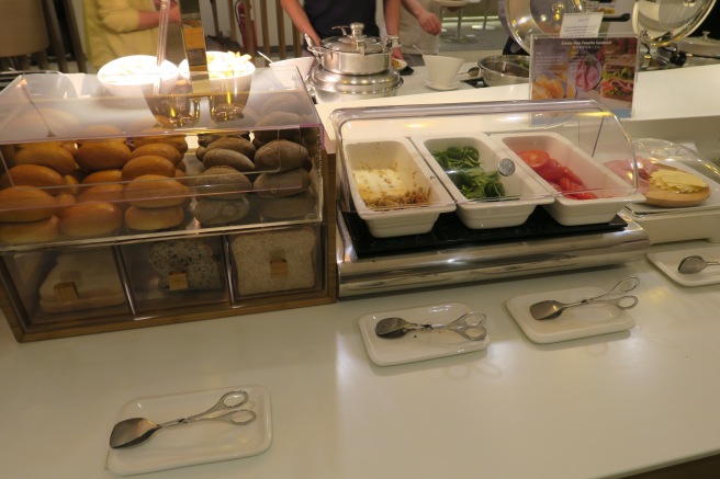 food in a buffet with a variety of food in containers