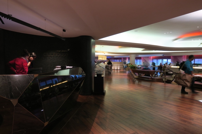 a lobby with a large reception desk