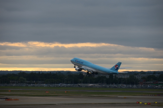 a plane taking off from a runway