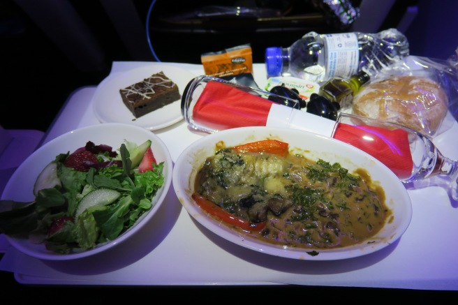 food on a tray with food and drinks