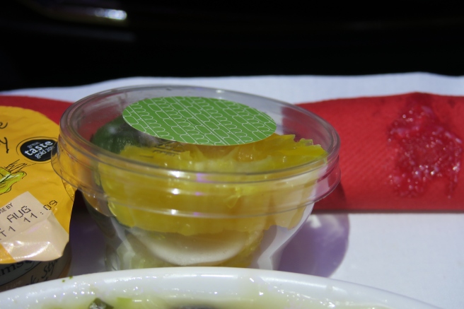 a plastic container with food in it