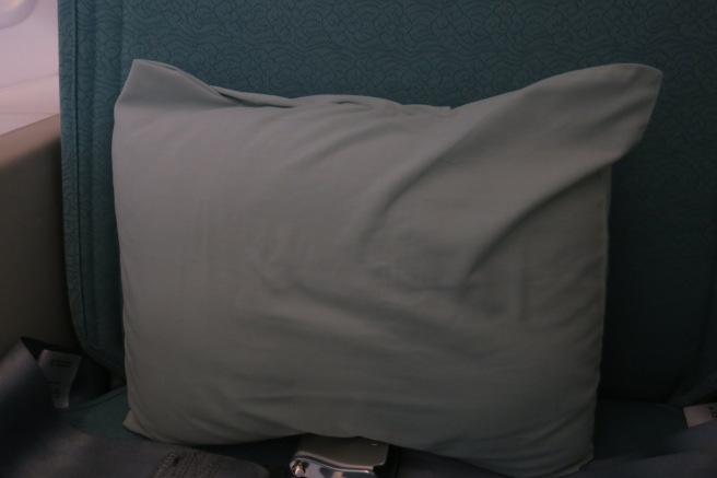 a pillow on a bed