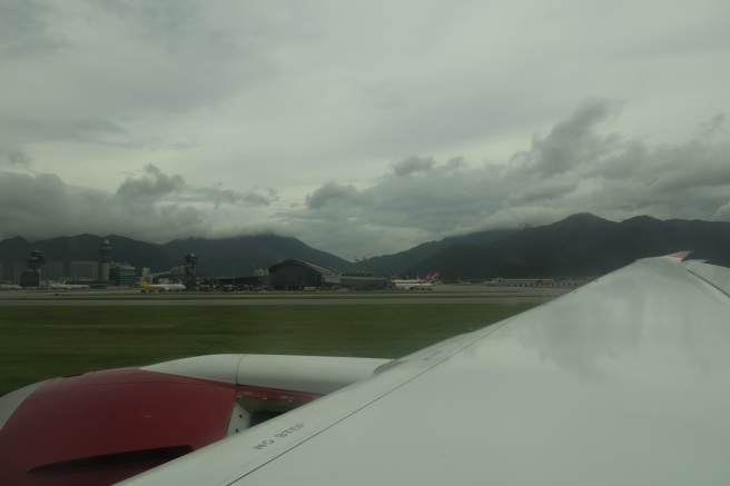 a plane wing on a runway