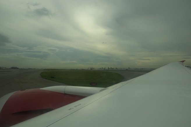 an airplane wing on a runway