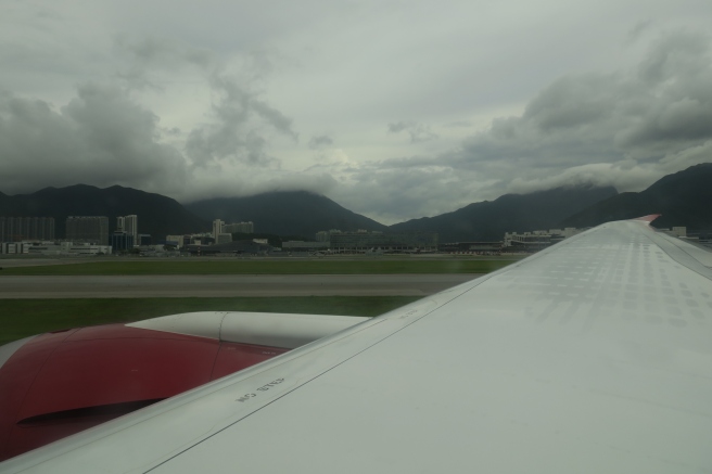 a plane wing on a runway