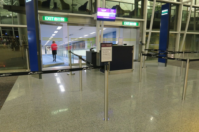 a person standing in a line in an airport