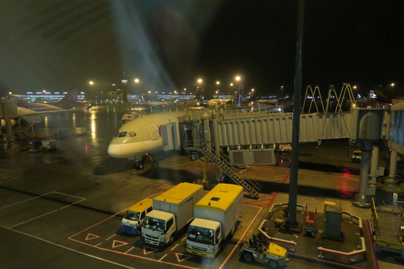 a plane on the tarmac at night