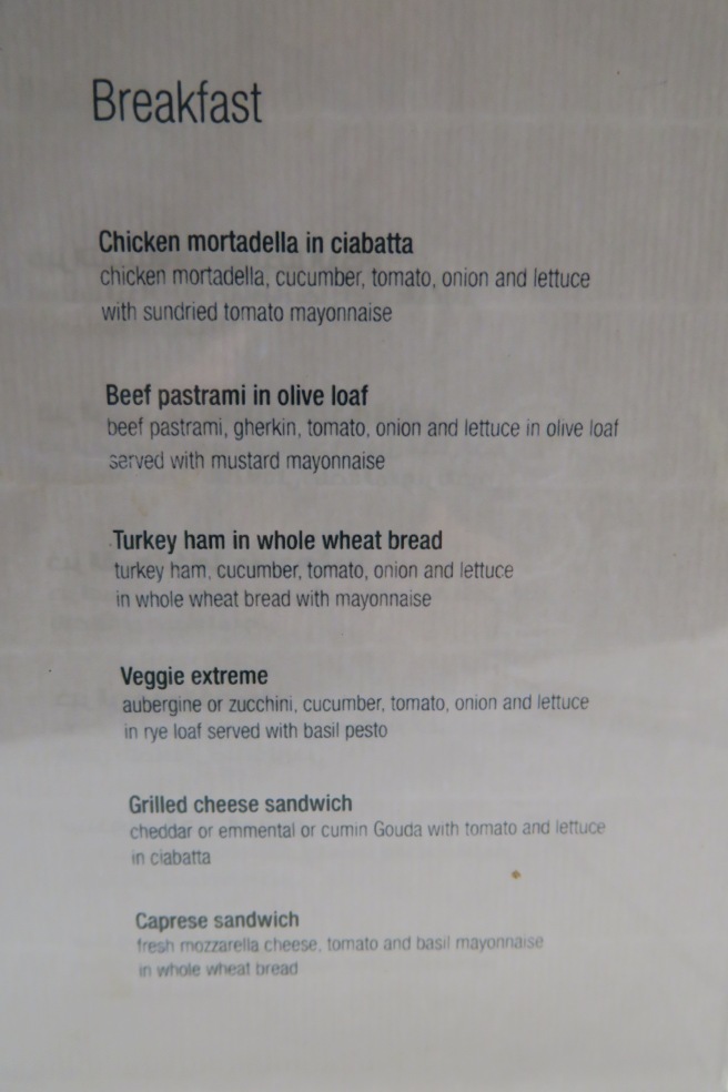 a menu of food on a white surface