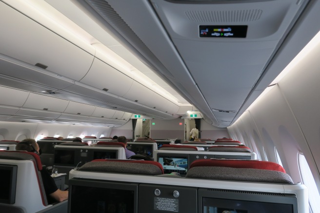 a plane with seats and monitors