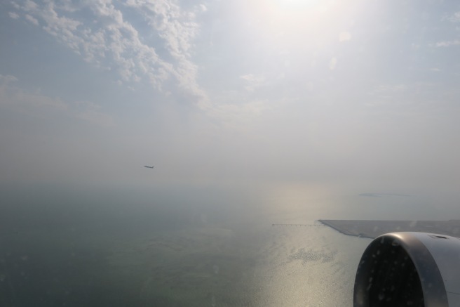 an airplane flying over water