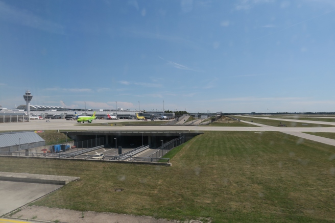 an airport with airplanes on the ground