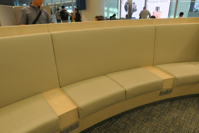 a long curved bench in a room