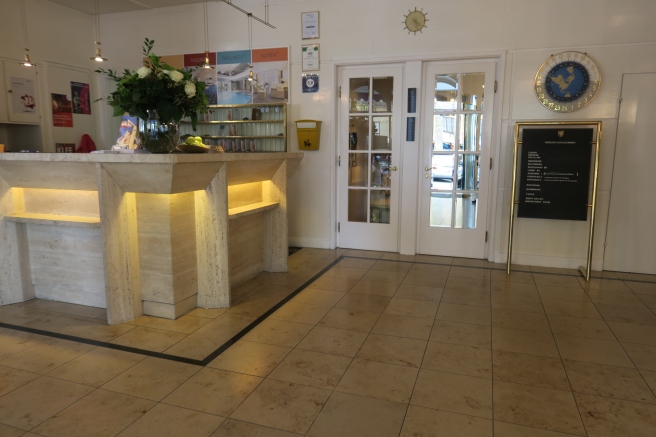 a reception desk in a hotel