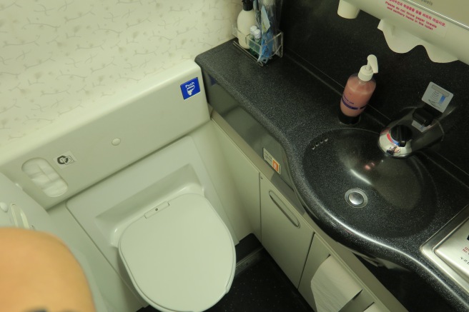 a sink and toilet in a bathroom