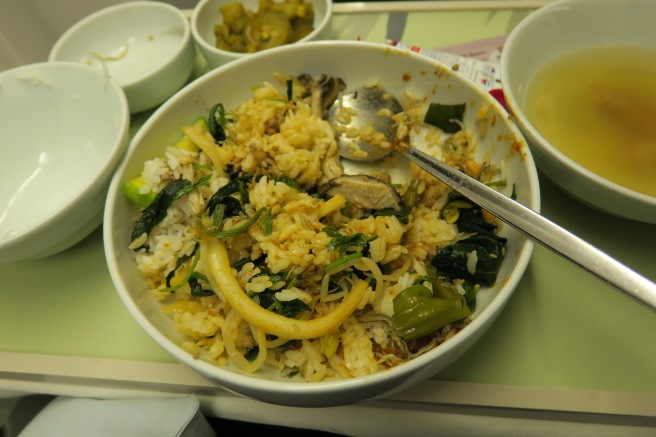 a bowl of food with a spoon