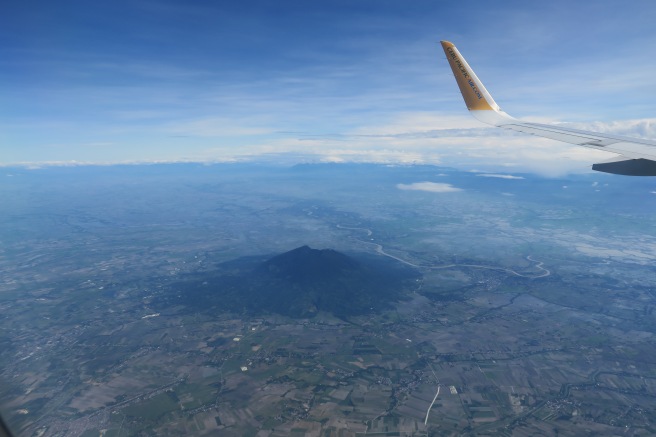 an airplane wing in the air