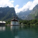 a building next to a body of water